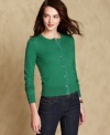 Tommy Hilfiger's solid cardigan offers a preppy touch to any ensemble. Pair it with jeans or with a chic little dress.