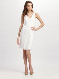 Timelessly elegant and romantic, this crisp, allover lace sheath features flirty scalloped trim. V-neck Sleeveless Scalloped trim on neckline, armholes and hem Princess seams Side zipper About 37 from shoulder to hem 91% nylon/9% spandex Hand wash Imported Timelessly elegant and romantic, this crisp, allover lace sheath features flirty scalloped trim. V-neck Sleeveless Scalloped trim on neckline, armholes and hem Princess seams Side zipper About 37 from shoulder to hem 91% nylon/9% spandex Hand wash Imported