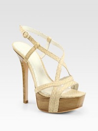 Strappy, snake-embossed leather with an adjustable ankle strap and chunky island platform. Stacked heel, 6 (150mm)Island platform, 2 (50mm)Compares to a 4 heel (100mm)Snake-embossed leather upperLeather liningBuffed leather solePadded insoleImportedOUR FIT MODEL RECOMMENDS ordering one half size up as this style runs small. Strappy, snake-embossed leather with an adjustable ankle strap and chunky island platform. Stacked heel, 6 (150mm)Island platform, 2 (50mm)Compares to a 4 heel (100mm)Snake-embossed leather upperLeather liningBuffed leather solePadded insoleImportedOUR FIT MODEL RECOMMENDS ordering one half size up as this style runs small.