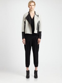 Identifiably urban jacket in a jacquard silhouette, defined by contrasting leather trim and moto-inspired zippers. CollarlessDropped shouldersAsymmetrical front zipperLong sleeves with zippered cuffsZippered slash pocketsAbout 22 from shoulder to hemBody: 80% virgin wool/20% nylonTrim: LeatherDry cleanImported of Italian fabricModel shown is 5'11 (178cm) wearing US size 4. Identifiably urban jacket in a jacquard silhouette, defined by contrasting leather trim and moto-inspired zippers. CollarlessDropped shouldersAsymmetrical front zipperLong sleeves with zippered cuffsZippered slash pocketsAbout 22 from shoulder to hemBody: 80% virgin wool/20% nylonTrim: LeatherDry cleanImported of Italian fabricModel shown is 5'11 (178cm) wearing US size 4.