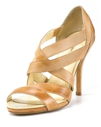 It's all about asymmetry. Leather high heel sandals with asymmetric criss-cross straps. It's all about asymmetry. Leather high heel sandals with asymmetric criss-cross straps.
