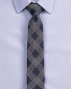 A sartorial finish to your office attire, finely crafted in luxurious patterned silk.About 2½ wideSilkDry cleanImported