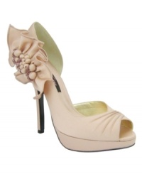 Dramatic floral detail on the back of the Neva platform evening pumps by Nina will ensure that you're the center of everyone's attention. Dramatic floral detail on the back of the Neva platform evening pumps by Nina will ensure that you're the center of everyone's attention.