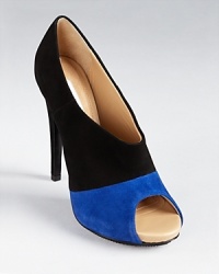 In bold blue and classic black, DIANE von FURSTENBERG's Judith booties pack a stylish punch. In bold blue and classic black, DIANE von FURSTENBERG's Judith booties pack a stylish punch.