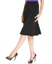 A wardrobe essential, Ellen Tracy's flattering flared skirt is perfect with anything from flowing blouses to button-front shirts. A wardrobe essential, Ellen Tracy's flattering flared skirt is perfect with anything from flowing blouses to button-front shirts.