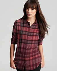 A little bit country, a little bit punk, this Burberry Brit shirt flaunts a statement plaid in a romantic-inspired palette for an effortlessly cool style mix. A little bit country, a little bit punk, this Burberry Brit shirt flaunts a statement plaid in a romantic-inspired palette for an effortlessly cool style mix.