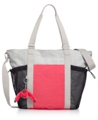 Ready for whatever your day delivers, this lightweight nylon carryall from Kipling stows all your essentials with ease. Outfitted with plenty of pockets for secure storage, it's sized-right for work or weekend, and everything in between. Ready for whatever your day delivers, this lightweight nylon carryall from Kipling stows all your essentials with ease. Outfitted with plenty of pockets for secure storage, it's sized-right for work or weekend, and everything in between.