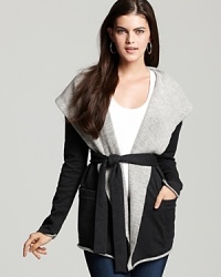 Meet your go-to fall/winter layer. You'll never want to take off this James Perse sweater, featuring a wide shawl color, waist-cinching belt, and comfy-chic pockets. Meet your go-to fall/winter layer. You'll never want to take off this James Perse sweater, featuring a wide shawl color, waist-cinching belt, and comfy-chic pockets.