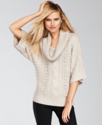 An oversized cable adds a new twist to INC's slouchy-chic cowlneck sweater. The metallic knit adds just the right amount of festive shine! An oversized cable adds a new twist to INC's slouchy-chic cowlneck sweater. The metallic knit adds just the right amount of festive shine!
