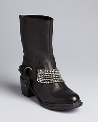 Designer Vera Wang is a personal fan of moto booties; her Vera Wang style is all dressed up with distinctive, draped sparkling details. Designer Vera Wang is a personal fan of moto booties; her Vera Wang style is all dressed up with distinctive, draped sparkling details.