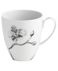 Compose a striking arrangement with the Black Orchid mug by Michael Aram. Fine white Limoges porcelain flourishes under a dark watercolor motif inspired by foliage from around the world. Compose a striking arrangement with the Black Orchid mug by Michael Aram. Fine white Limoges porcelain flourishes under a dark watercolor motif inspired by foliage from around the world.