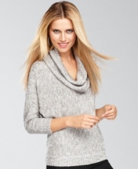Dazzle them in INC's sequined knit sweater. A slouchy cowl neckline and chic dolman sleeves make a can't miss combination. Dazzle them in INC's sequined knit sweater. A slouchy cowl neckline and chic dolman sleeves make a can't miss combination.
