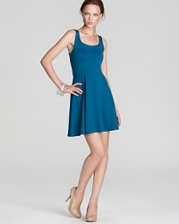 A fit-and-flare silhouette makes this skater-style dress ultra flattering. Work it all season long to flirty effect -- no triple axels necessary! A fit-and-flare silhouette makes this skater-style dress ultra flattering. Work it all season long to flirty effect -- no triple axels necessary!