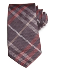 Crafted in soft silk, this signature check Burberry tie adds modern polish to your distinguished attire. A fetching addition to your lavish collection. Crafted in soft silk, this signature check Burberry tie adds modern polish to your distinguished attire. A fetching addition to your lavish collection.