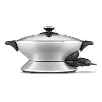 Create authentic Asian dishes with the innovative Hot Wok.The unique 1500-watt butterfly element distributes heat evenly up the walls of the wok, maximizing its high-heat searing potential. The heat-responsive aluminum layers maintain this temperature to sear food, sealing in moisture for mouth-watering results. Create authentic Asian dishes with the innovative Hot Wok.The unique 1500-watt butterfly element distributes heat evenly up the walls of the wok, maximizing its high-heat searing potential. The heat-responsive aluminum layers maintain this temperature to sear food, sealing in moisture for mouth-watering results.