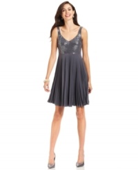 The holidays are meant for glitz and glam and this petite A-line spense dress has all the right elements! A sequined top and swirly, pleated skirt create a charming ensemble. The holidays are meant for glitz and glam and this petite A-line spense dress has all the right elements! A sequined top and swirly, pleated skirt create a charming ensemble.