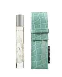 Chantecaille's beautiful signature scents now have convenience and portability. The elegant, silk-screened glass tube arrives in a chic turquoise faux-croc pouch. Blending the exhilarating salt air and wild landscape of the Turquoise seas with the delicate freshness of classic white flowers like Gardenia and Jasmine, Chantecaille's unusual Tiare introduces an incredibly up fragrance that redefines the scent and experience of a beautiful white flower scent. Chantecaille's beautiful signature scents now have convenience and portability. The elegant, silk-screened glass tube arrives in a chic turquoise faux-croc pouch. Blending the exhilarating salt air and wild landscape of the Turquoise seas with the delicate freshness of classic white flowers like Gardenia and Jasmine, Chantecaille's unusual Tiare introduces an incredibly up fragrance that redefines the scent and experience of a beautiful white flower scent.
