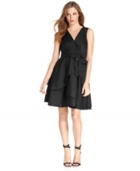 Beautiful tiers and a sweet self-tie sash make this DKNYC dress a gorgeous option for a special night. Beautiful tiers and a sweet self-tie sash make this DKNYC dress a gorgeous option for a special night.