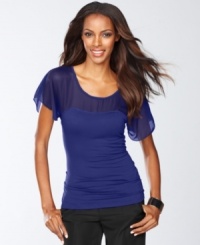 INC adds a delicate touch to a petite flutter-sleeve top with sheer, ethereal chiffon. A pretty way to dress up everything from a knit skirt to your favorite jeans. INC adds a delicate touch to a petite flutter-sleeve top with sheer, ethereal chiffon. A pretty way to dress up everything from a knit skirt to your favorite jeans.