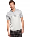 A rich weave gives this polo shirt from Calvin Klein a luxurious look and feel.