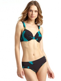 THE LOOKAbstract print, alloverRuched, adjustable spaghetti straps with ornament detailsPadded cups with gentle ruching and underwire supportBack tie closureTHE MATERIAL92% nylon/8% spandexFully linedCARE & ORIGINHand washImportedPlease note: Bikini bottom sold separately. THE LOOKAbstract print, alloverRuched, adjustable spaghetti straps with ornament detailsPadded cups with gentle ruching and underwire supportBack tie closureTHE MATERIAL92% nylon/8% spandexFully linedCARE & ORIGINHand washImportedPlease note: Bikini bottom sold separately.