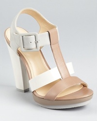 In a pale, chalky palette, these Calvin Klein sandals mix smooth leather, glossy patent, and soft suede. In a pale, chalky palette, these Calvin Klein sandals mix smooth leather, glossy patent, and soft suede.