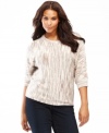 A unique knit brings new life to a classic plus size sweater from INC. Metallic adds a touch of appealing shine!