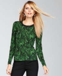 A dose of beaded shine at the neckline of this petite INC sweater puts an extra elevating spin on the snakeskin print. A dose of beaded shine at the neckline of this petite INC sweater puts an extra elevating spin on the snakeskin print.