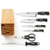 Set includes: 4 parer, 5 Serrated utility knife, 8 Chef's, 5 Hollow-edge Santoku, 9 Sharpening Steel, hardwood block, and TWIN L kitchen shears.