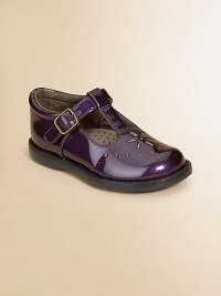 Shiny patent polishes this classic Mary Jane style with floral cutout detailing. Ankle strap with grip-tape closure Leather lining Padded insole Rubber sole Nappa polyurethane Imported Shiny patent polishes this classic Mary Jane style with floral cutout detailing. Ankle strap with grip-tape closure Leather lining Padded insole Rubber sole Nappa polyurethane Imported
