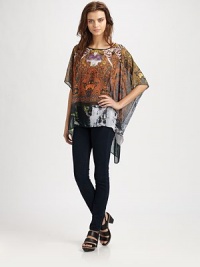 Slightly faded, paisley-printed top in a semi-sheer silhouette with three-quarter kimono sleeves and an asymmetrical hem that hits below the hips. BoatneckThree-quarter kimono sleevesAsymmetrical hem hits below the hipsPolyesterDry cleanMade in USA of imported fabricModel shown is 5'10 (177cm) wearing US size Small. Slightly faded, paisley-printed top in a semi-sheer silhouette with three-quarter kimono sleeves and an asymmetrical hem that hits below the hips. BoatneckThree-quarter kimono sleevesAsymmetrical hem hits below the hipsPolyesterDry cleanMade in USA of imported fabricModel shown is 5'10 (177cm) wearing US size Small.