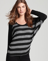 Smart neutral stripes and stylish dolman sleeves enrich this lightweight Red Haute sweater for that effortlessly-chic look you love. Smart neutral stripes and stylish dolman sleeves enrich this lightweight Red Haute sweater for that effortlessly-chic look you love.