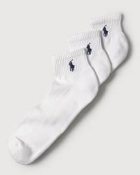 Polo Ralph Lauren set of three stretch cotton quarter socks feature a cushioned foot and ribbed top. Polo player embroidered detail. Three pairs of socks per set. Polo Ralph Lauren set of three stretch cotton quarter socks feature a cushioned foot and ribbed top. Polo player embroidered detail. Three pairs of socks per set.