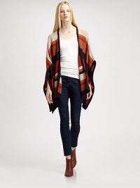 Crafted with head-turning stripes and draped poncho sleeves, this sweater coat finishes the look with an open front and textured finish. Open frontThree-quarter poncho sleevesRibbed cuffs and hemAbout 27 from shoulder to hem85% acrylic/15% nylonHand washImportedModel shown is 5'10 (177cm) wearing US size XS/S. Crafted with head-turning stripes and draped poncho sleeves, this sweater coat finishes the look with an open front and textured finish. Open frontThree-quarter poncho sleevesRibbed cuffs and hemAbout 27 from shoulder to hem85% acrylic/15% nylonHand washImportedModel shown is 5'10 (177cm) wearing US size XS/S.
