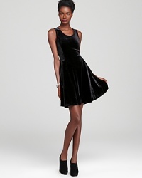 A flirty Aqua stretch-velvet dress perfects date night style, boasting a flared skirt and edgy back zip for a modern feminine look. A flirty Aqua stretch-velvet dress perfects date night style, boasting a flared skirt and edgy back zip for a modern feminine look.