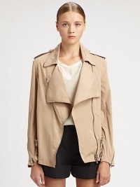 An unexpected approach to the biker jacket, this polyester and cotton design has trenchcoat-inspired details and a draped front. Notched collarDraped frontEpauletsAsymmetrical front zipperLong sleeves with zippered cuffsBack rain flapAbout 26 from shoulder to hemPolyester/cottonDry cleanImported of Italian fabricSIZE & FITModel shown is 5'10 (177cm) wearing US size 4. An unexpected approach to the biker jacket, this polyester and cotton design has trenchcoat-inspired details and a draped front. Notched collarDraped frontEpauletsAsymmetrical front zipperLong sleeves with zippered cuffsBack rain flapAbout 26 from shoulder to hemPolyester/cottonDry cleanImported of Italian fabricSIZE & FITModel shown is 5'10 (177cm) wearing US size 4.
