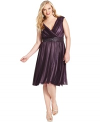 Jessica Howard's plus size dress is made beautiful with a beaded empire waist and a sheer overlay that's gathered at the bust and softly pleated through the skirt. (Clearance) Jessica Howard's plus size dress is made beautiful with a beaded empire waist and a sheer overlay that's gathered at the bust and softly pleated through the skirt. (Clearance)