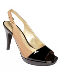 Shiny and eye-catching. The Curated Bandolino slingback platform pumps feature a cute patent leather peep-toe. Shiny and eye-catching. The Curated Bandolino slingback platform pumps feature a cute patent leather peep-toe.