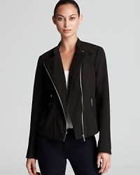 The ultimate urban topper, this lightweight Calvin Klein jacket flaunts a slim, moto-inspired silhouette punctuated with asymmetrical zips for real modern edge. The ultimate urban topper, this lightweight Calvin Klein jacket flaunts a slim, moto-inspired silhouette punctuated with asymmetrical zips for real modern edge.
