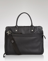 Transport your laptop and other everyday essentials to the office or cafe with this fine brief in pebbled leather, a classic design with masculine appeal from John Varvatos USA. Transport your laptop and other everyday essentials to the office or cafe with this fine brief in pebbled leather, a classic design with masculine appeal from John Varvatos USA.
