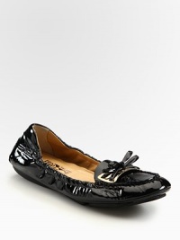 Stretchy patent leather with a dainty bow embellishment. Patent leather upperLeather lining and solePadded insoleMade in Italy Stretchy patent leather with a dainty bow embellishment. Patent leather upperLeather lining and solePadded insoleMade in Italy