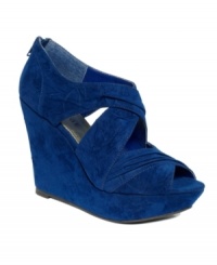 Walk tall and look glam doing it. Rampage's Leighton platform wedge sandals feature thick crisscrossing straps and an on-trend back zipper. Walk tall and look glam doing it. Rampage's Leighton platform wedge sandals feature thick crisscrossing straps and an on-trend back zipper.