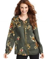 This petite tunic from Jones New York Signature features a smattering of pretty florals and a silky fabric. Pair it with your favorite jeans or pants for a complete look! This petite tunic from Jones New York Signature features a smattering of pretty florals and a silky fabric. Pair it with your favorite jeans or pants for a complete look!