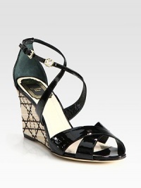 Grounded by a signature woven cannage wedge and platform, adjustable patent leather straps intertwine and conclude with logo hardware. Straw wedge, 5 (125mm)Compares to a 3 heel (75mm)Patent leather upperLeather lining and solePadded insoleMade in ItalyOUR FIT MODEL RECOMMENDS ordering true size. Grounded by a signature woven cannage wedge and platform, adjustable patent leather straps intertwine and conclude with logo hardware. Straw wedge, 5 (125mm)Compares to a 3 heel (75mm)Patent leather upperLeather lining and solePadded insoleMade in ItalyOUR FIT MODEL RECOMMENDS ordering true size.