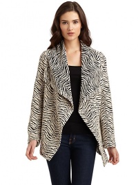 THE LOOKAllover jacquard woven construction with zebra printDraped flap collarOpen frontHandkerchief hemTHE FITAbout 28 from shoulder to hemTHE MATERIALWool/polyamide/polyesterCARE & ORIGINDry cleanImportedModel shown is 5'9½ (176cm) wearing US size Small. THE LOOKAllover jacquard woven construction with zebra printDraped flap collarOpen frontHandkerchief hemTHE FITAbout 28 from shoulder to hemTHE MATERIALWool/polyamide/polyesterCARE & ORIGINDry cleanImportedModel shown is 5'9½ (176cm) wearing US size Small.