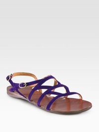 Strappy suede essential with a rubber sole and an adjustable ankle strap. Suede upperLeather liningRubber solePadded insoleMade in SpainOUR FIT MODEL RECOMMENDS ordering one half size up as this style runs small. Strappy suede essential with a rubber sole and an adjustable ankle strap. Suede upperLeather liningRubber solePadded insoleMade in SpainOUR FIT MODEL RECOMMENDS ordering one half size up as this style runs small.