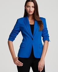 A vibrant palette accentuates the structured silhouette of a VINCE CAMUTO blazer for a bold, bright approach to your 9-to-5. Style with a colored pencil skirt and stop traffic from commute to corner office. A vibrant palette accentuates the structured silhouette of a VINCE CAMUTO blazer for a bold, bright approach to your 9-to-5. Style with a colored pencil skirt and stop traffic from commute to corner office.