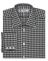 Freshen up your look with an energetic gingham check button-down, a timeless pattern that's remarkably upbeat and evocative with a tie from your refined collection. Freshen up your look with an energetic gingham check button-down, a timeless pattern that's remarkably upbeat and evocative with a tie from your refined collection.