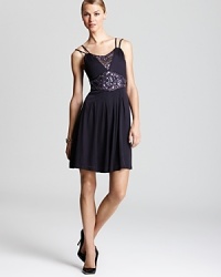 A beaded neckline and waist lend a sparkling sheen to this A line SW Studio by Sue Wong dress. A beaded neckline and waist lend a sparkling sheen to this A line SW Studio by Sue Wong dress.