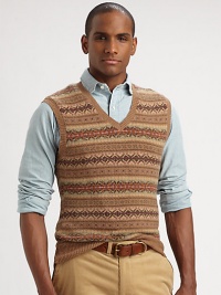 Knit from the finest cotton and cashmere yarns for a smooth hand, this timeless sweater vest is emboldened with a heritage Fair Isle pattern.V-neckRibbed knit collar, sleeves and hem85% cotton/15% cashmereDry cleanImported